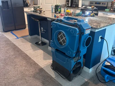 Blue drying equipment staged inside the affected property